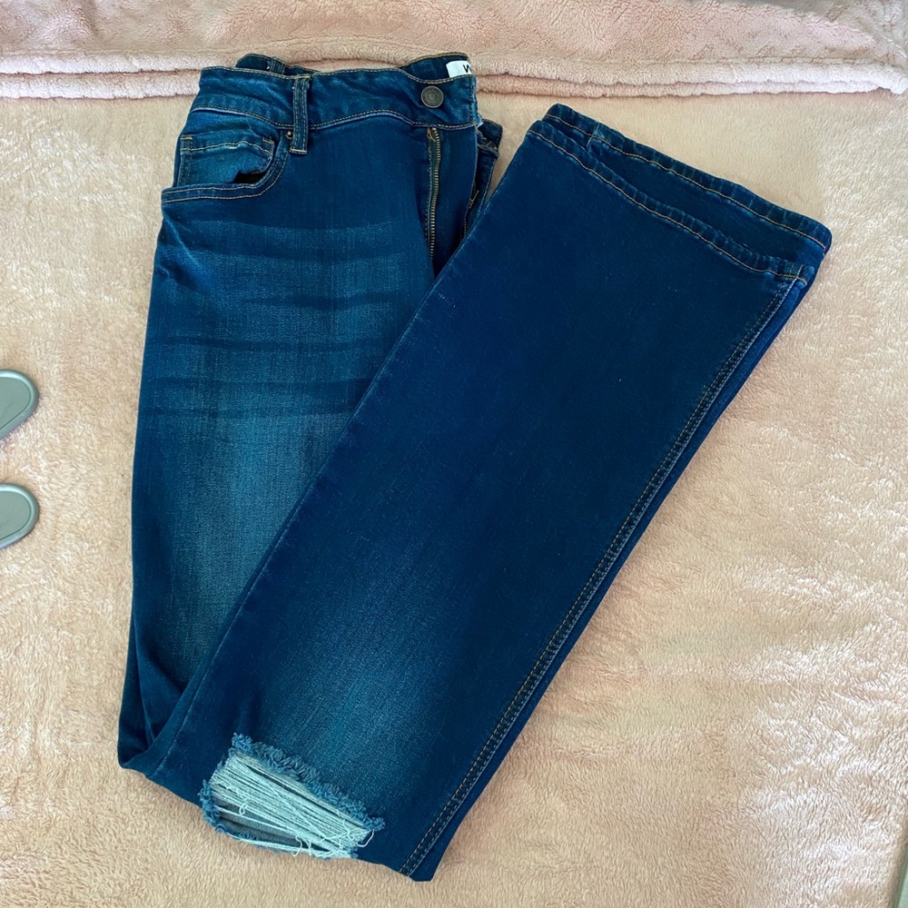 Ripped plus flare jeans